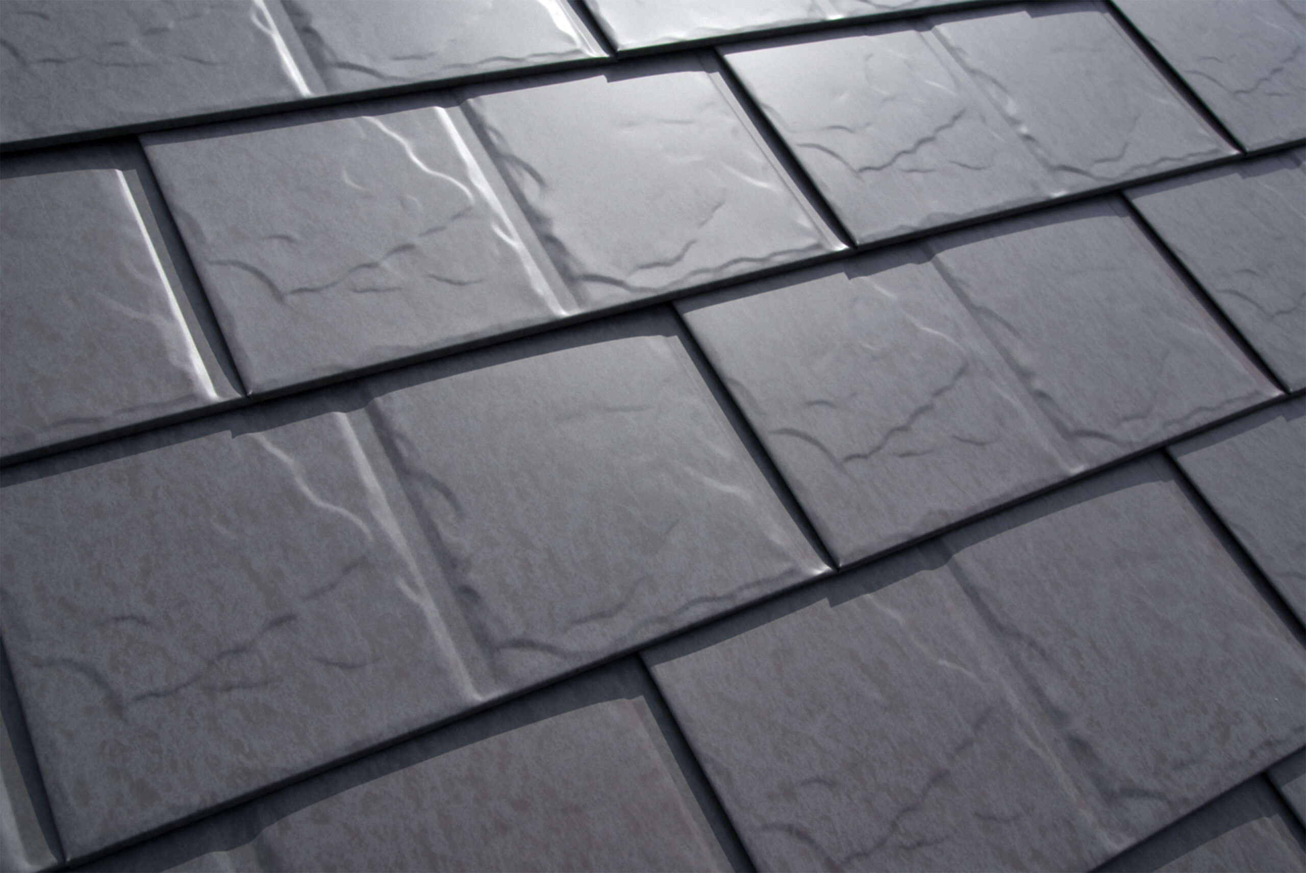 Premium Interlock aluminum shingles on a residential roof