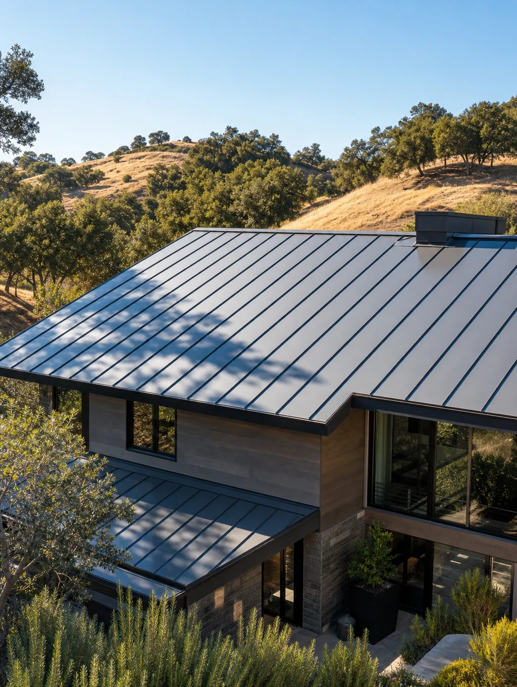 Standing seam metal roofing installation on a mountain residence in Asheville, North Carolina