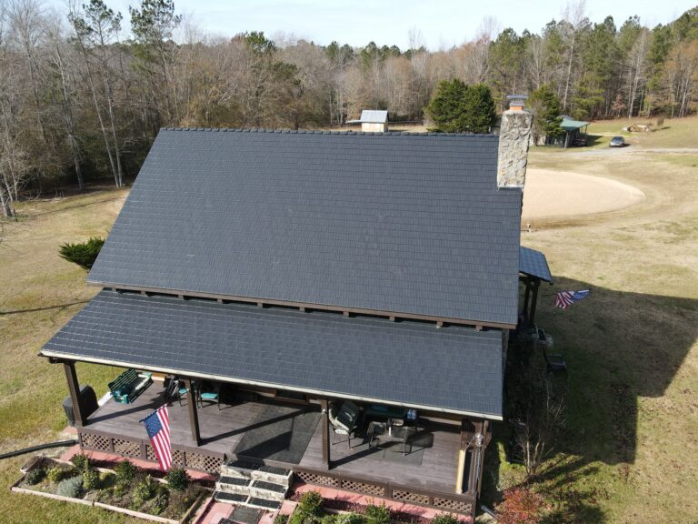 Completed dark Interlock aluminum metal roof on a North Carolina country home