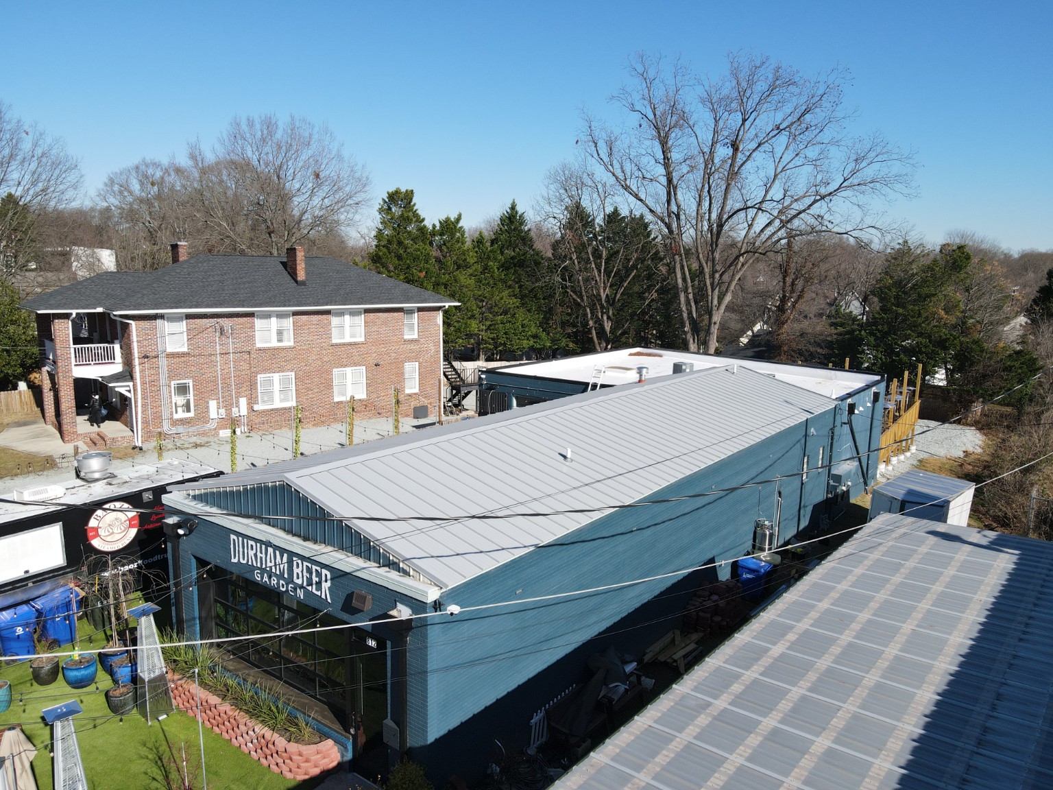 Wide view of Durham Beer Garden and its Kynar-finished standing seam metal roof