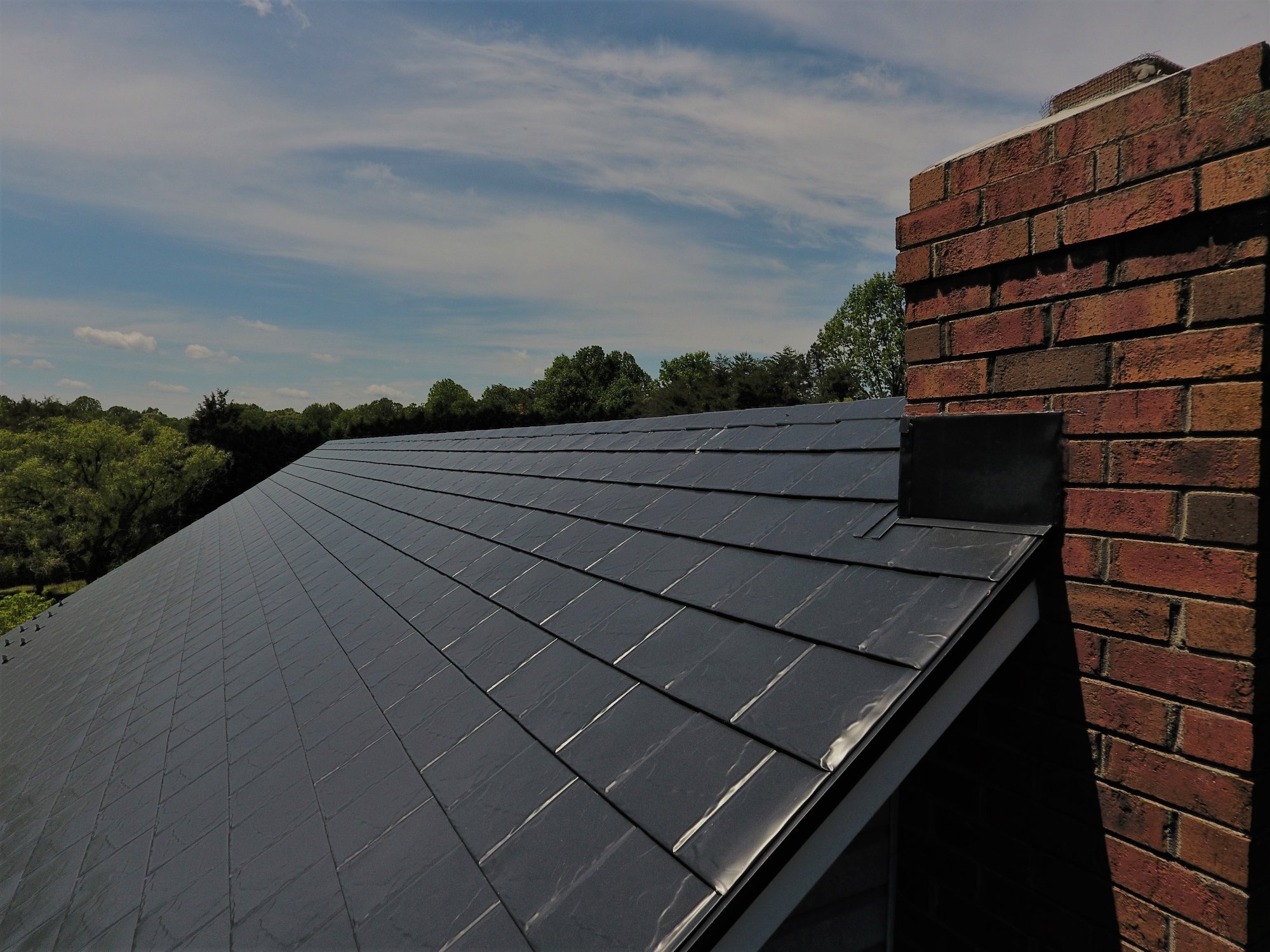 black slate-style metal roof project in Greensboro, North Carolina