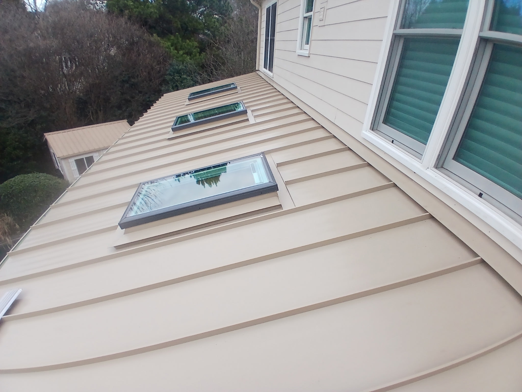 Completed 24-gauge Snaplock standing seam porch roof in Cary, North Carolina