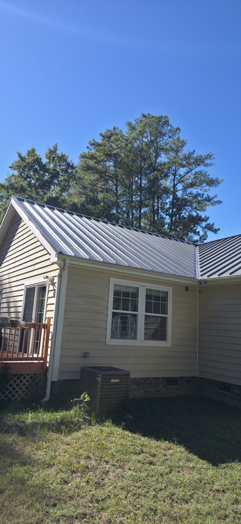 Side view of the completed standing seam roof and valley on a Garner, NC home.